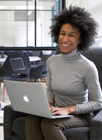 A dynamic woman engrossed in her tasks, radiating vitality through her vibrant work.
