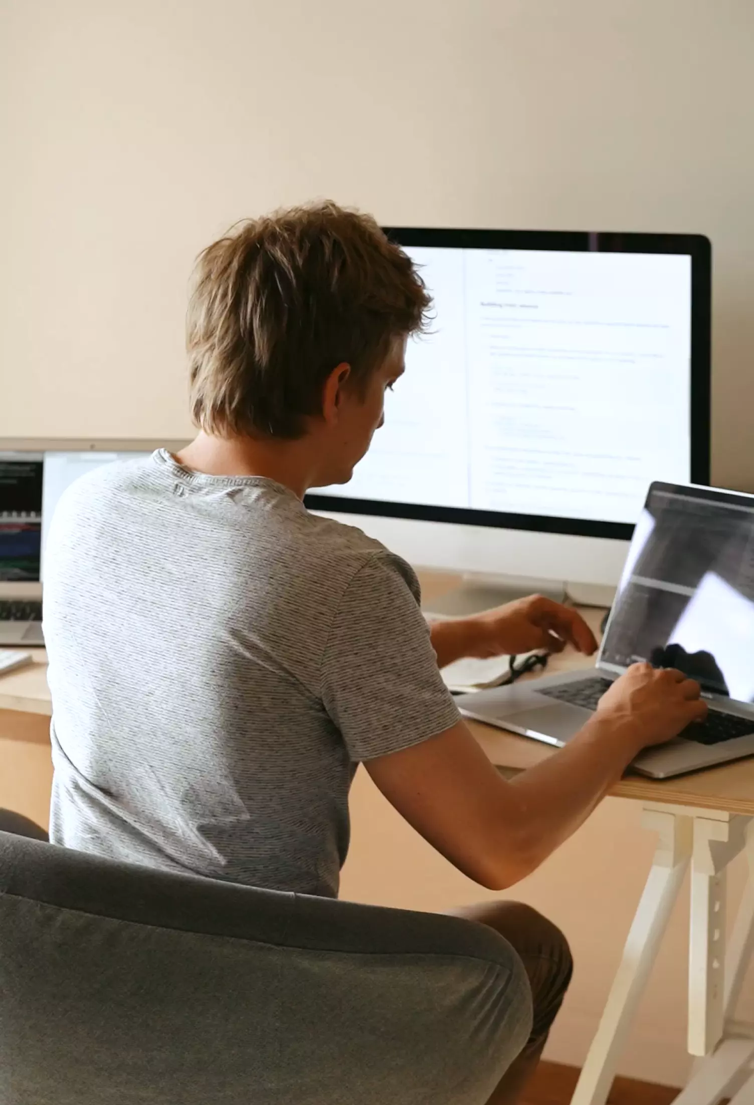 useA Professional engrossed in his computer, iligently immersed in there tasks