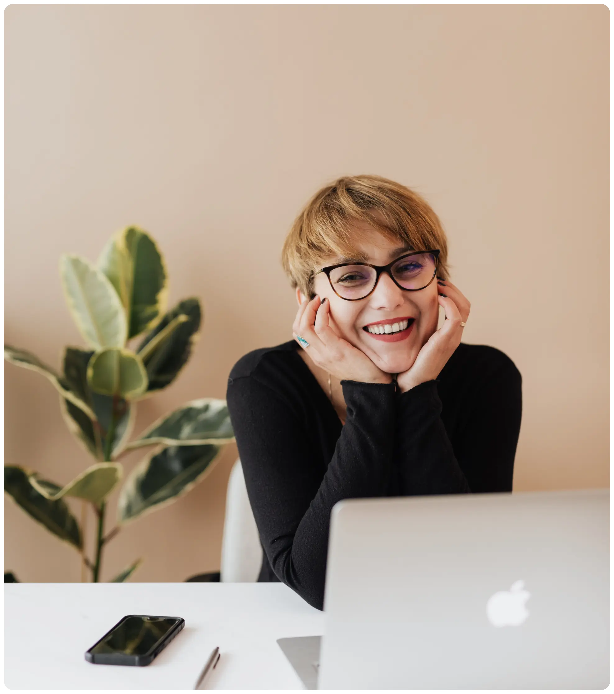 A portrait showcasing a content and professionally fulfilled woman.